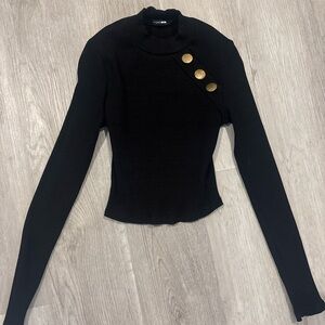 Elegant Black Top with Gold Accents